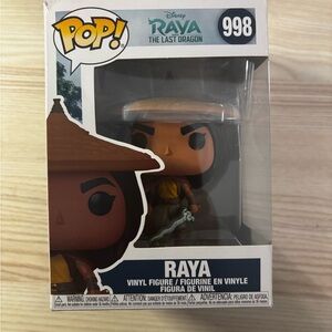 Funko Pop Raya Vinyl Figure with Brown and Yellow Outfit